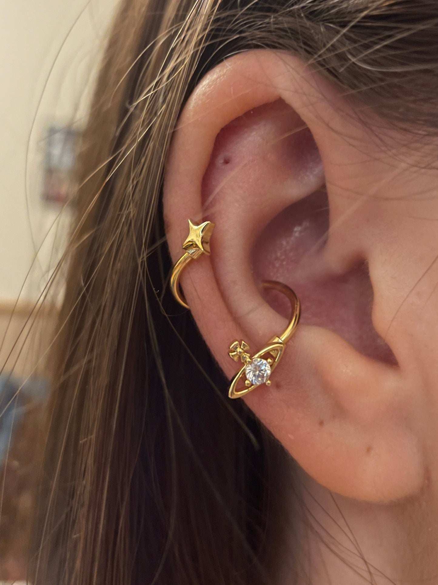 Gold Saturn Swirl Conch Earrings