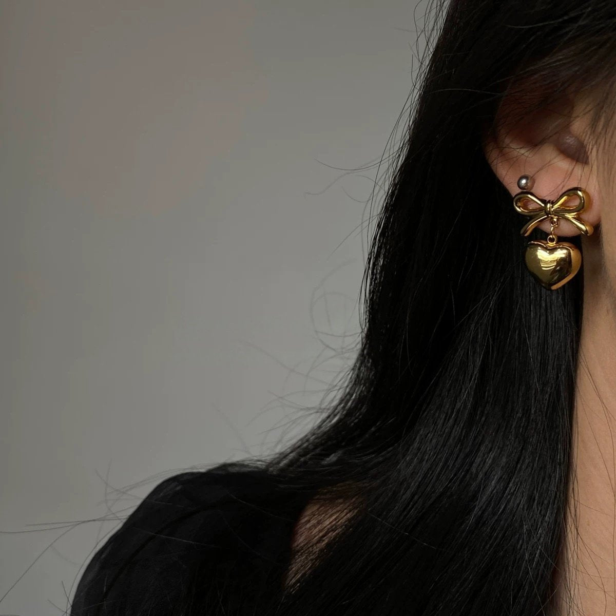 Eros Bow Gold Earrings