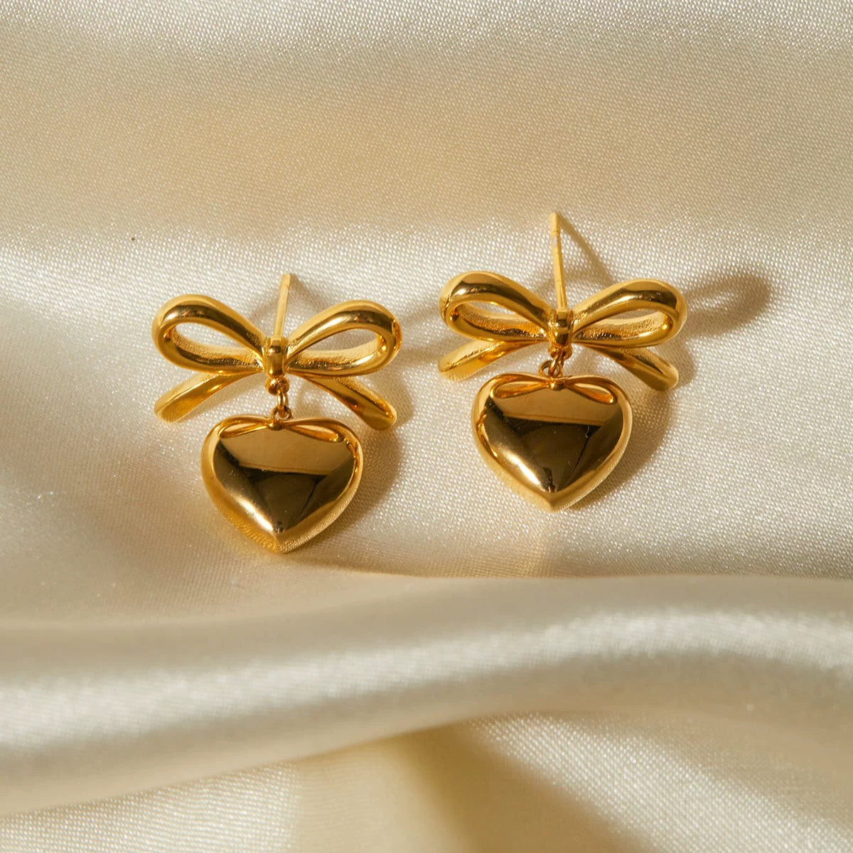 Eros Bow Gold Earrings