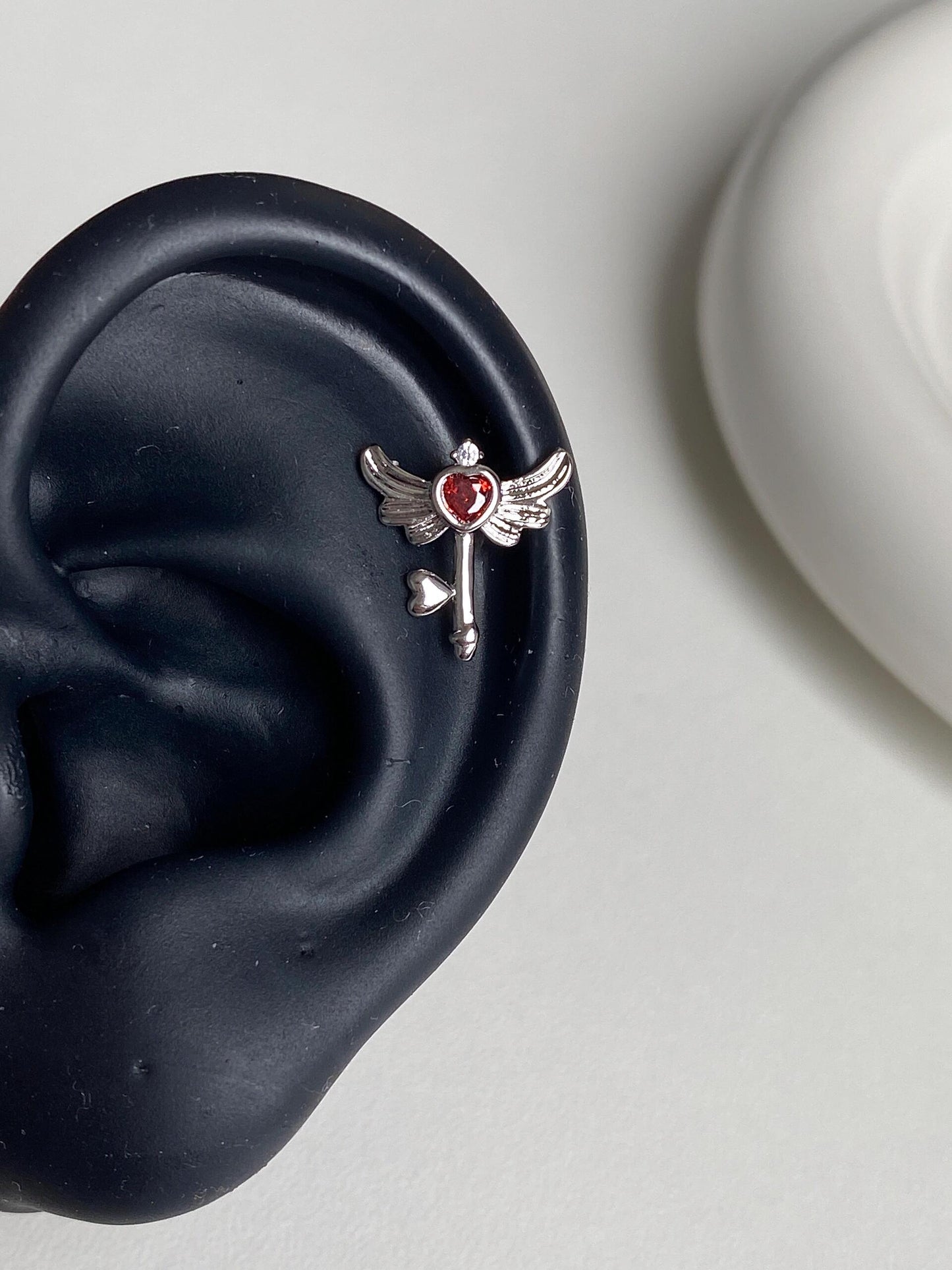 Winged Key Helix Earrings