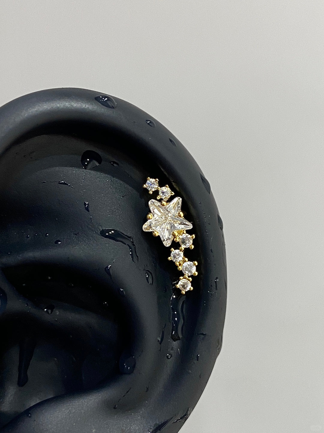 Gold Stellar Trail Helix Earrings