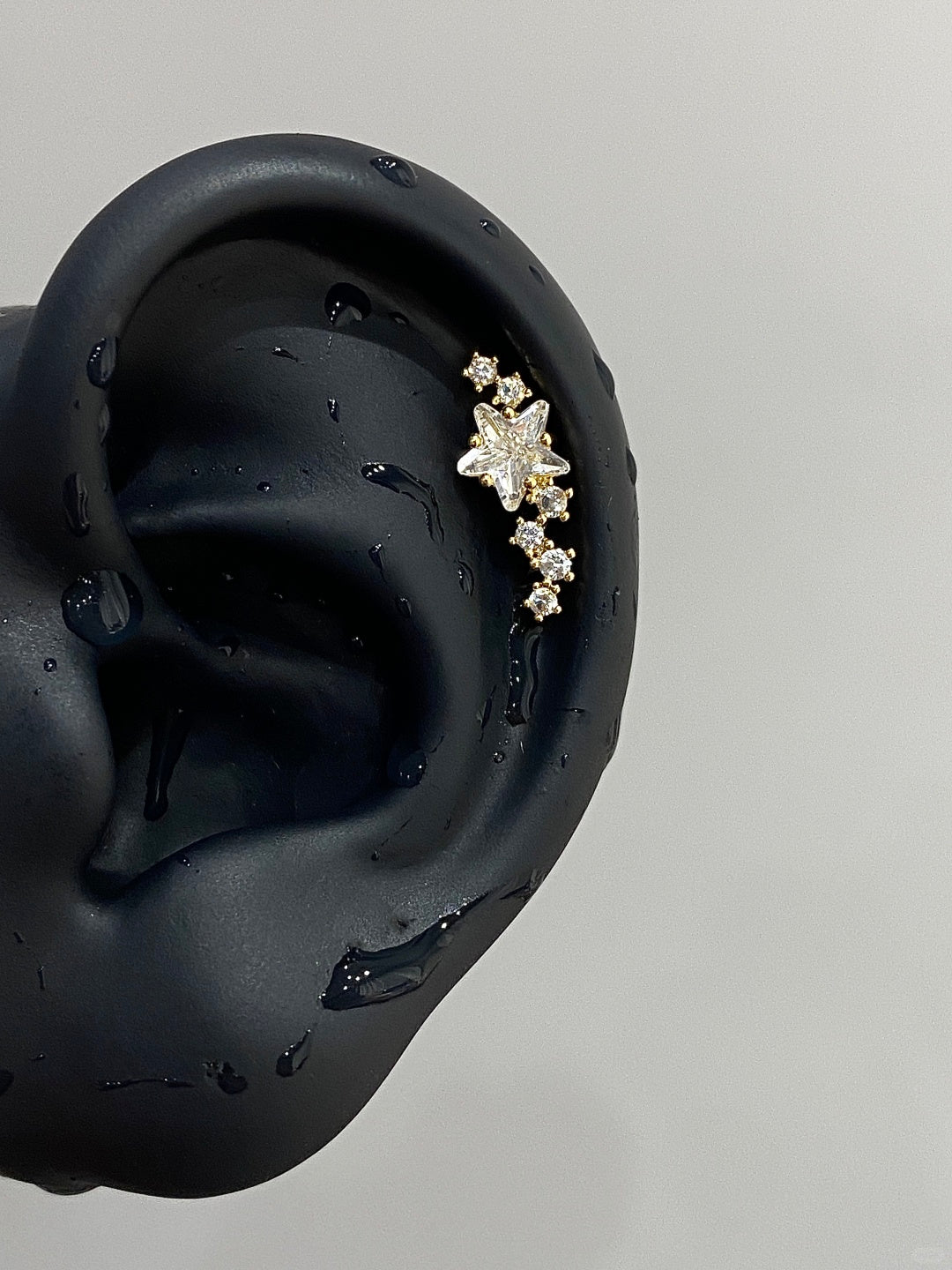 Gold Stellar Trail Helix Earrings