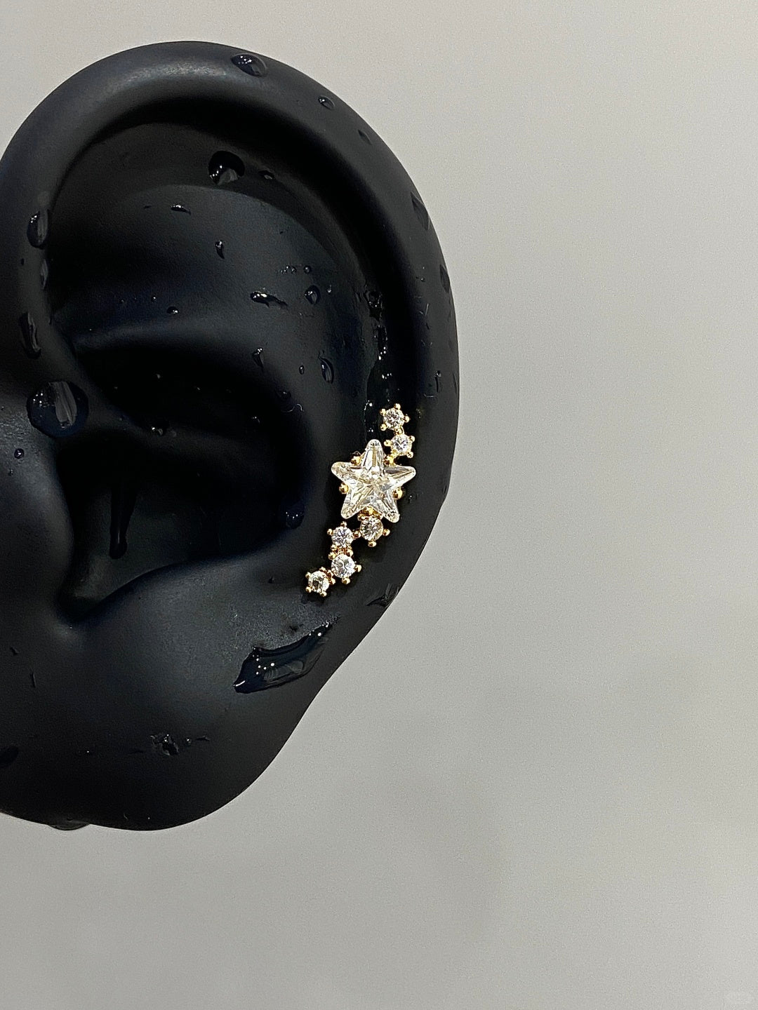 Gold Stellar Trail Helix Earrings